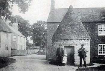 Lockup with policeman, child and vagrant about 1900 Z1130-54-36a